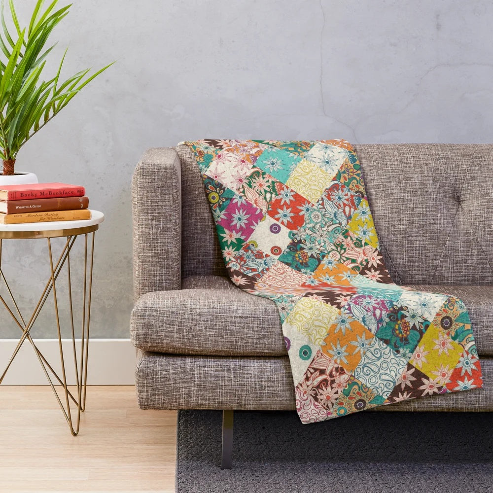 Colorful patchwork plush blanket with floral and vintage patterns