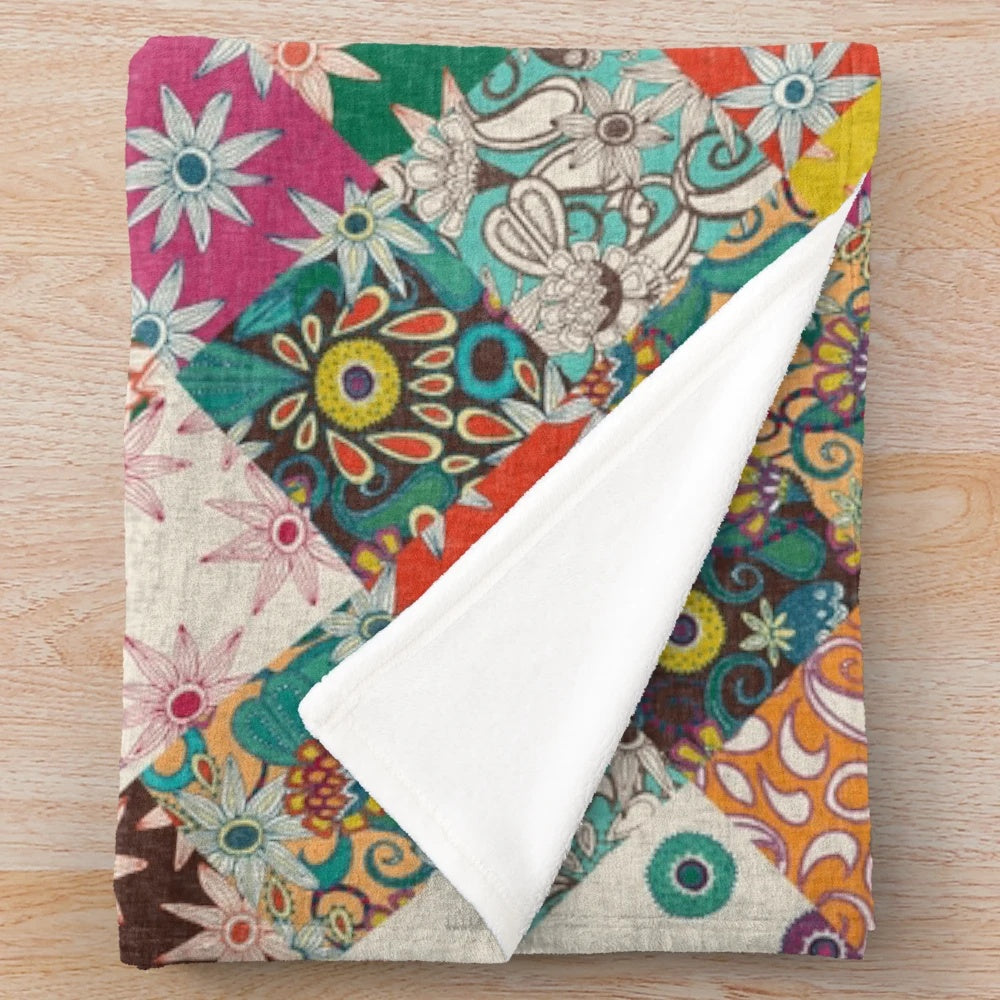 Colorful patchwork plush blanket with floral and vintage patterns