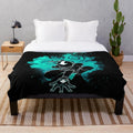 Colorful plush blanket with airbender silhouette design
