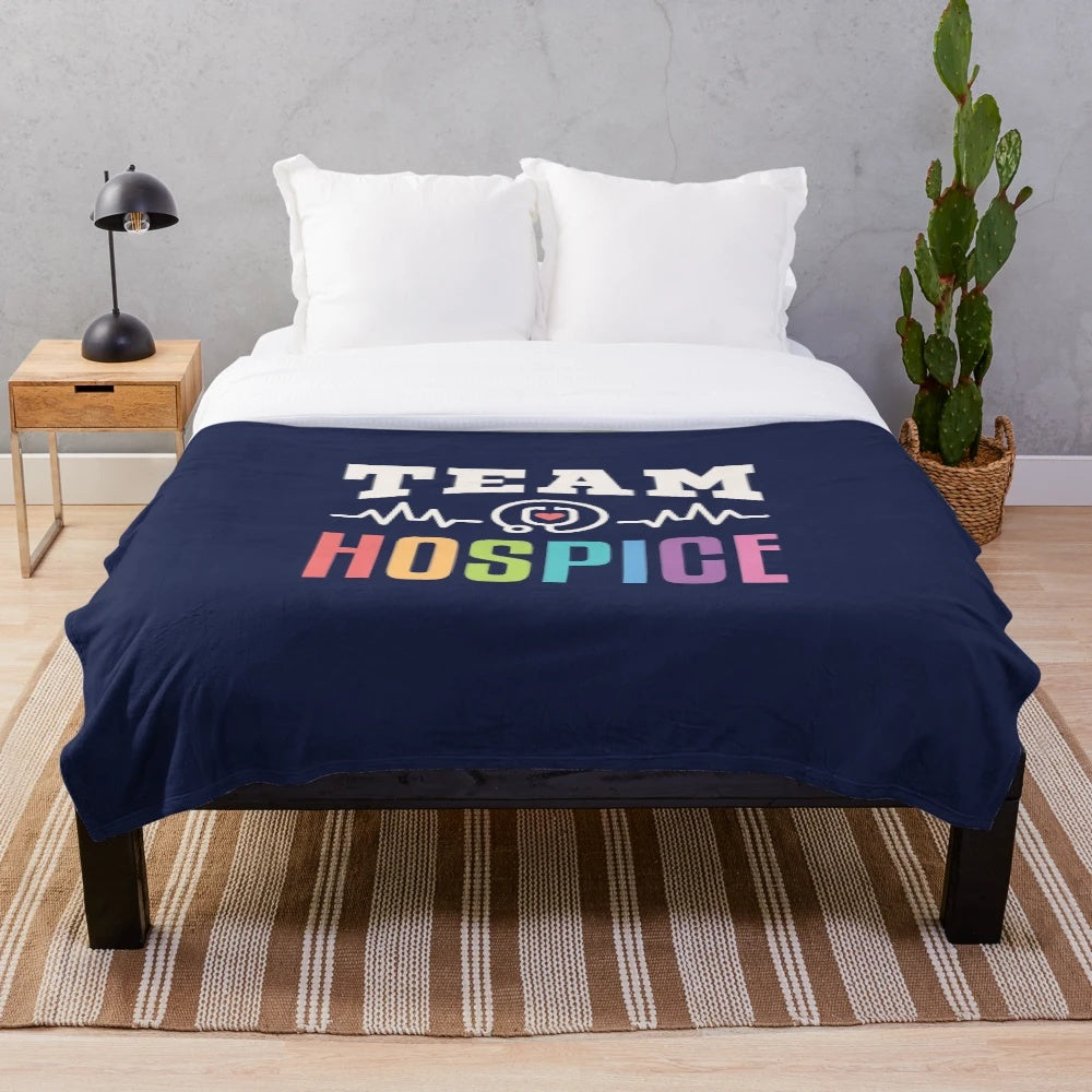 Colorful plush blanket featuring hospice team occupations