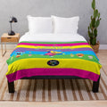 Colorful plush blanket featuring characters from Charlie's Colorforms City