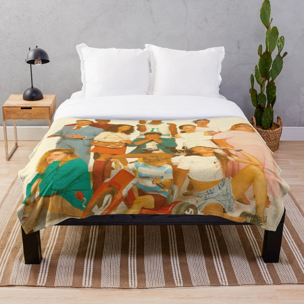 Colorful plush blanket featuring graphics and imagery inspired by the Glass Animals album "How to Be a Human Being