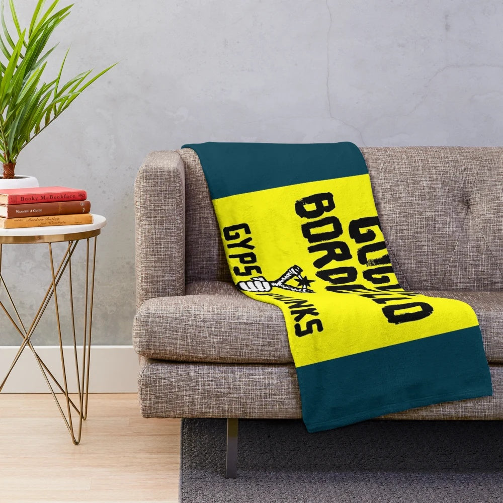 Colorful plush blanket featuring the Gogol Bordello band logo and design