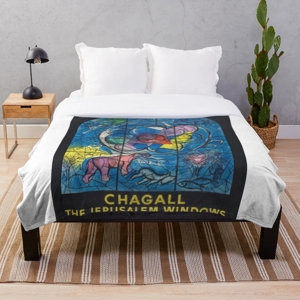 Plush blanket featuring a colorful design inspired by Marc Chagall's famous Jerusalem Windows artwork