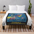 Plush blanket featuring a colorful design inspired by Marc Chagall's famous Jerusalem Windows artwork