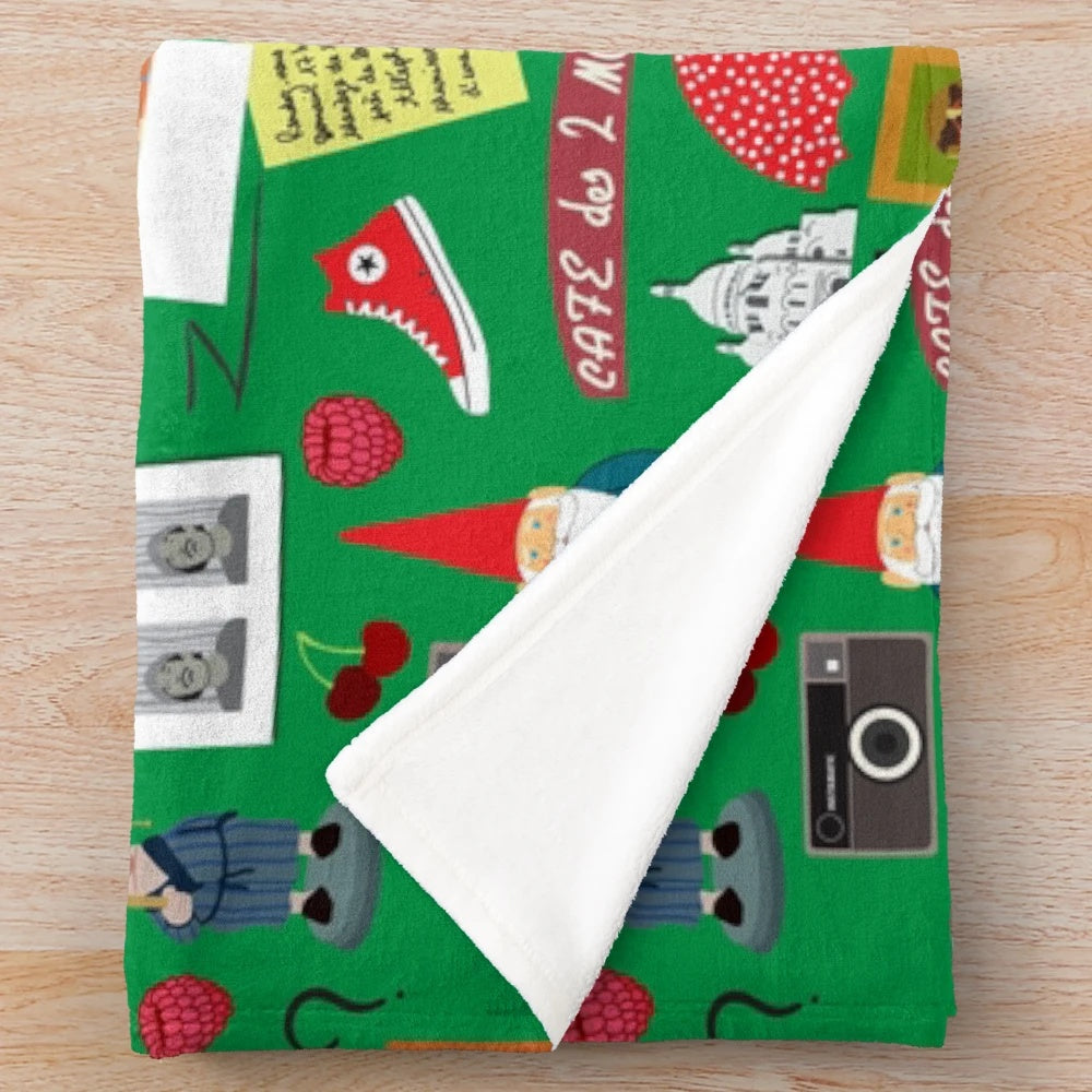 Colorful plush blanket featuring a vibrant pattern inspired by the French film Amélie