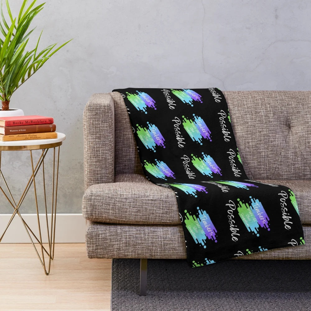 Colorful plush blanket with the text "Teachers Make All Other Occupations Possible