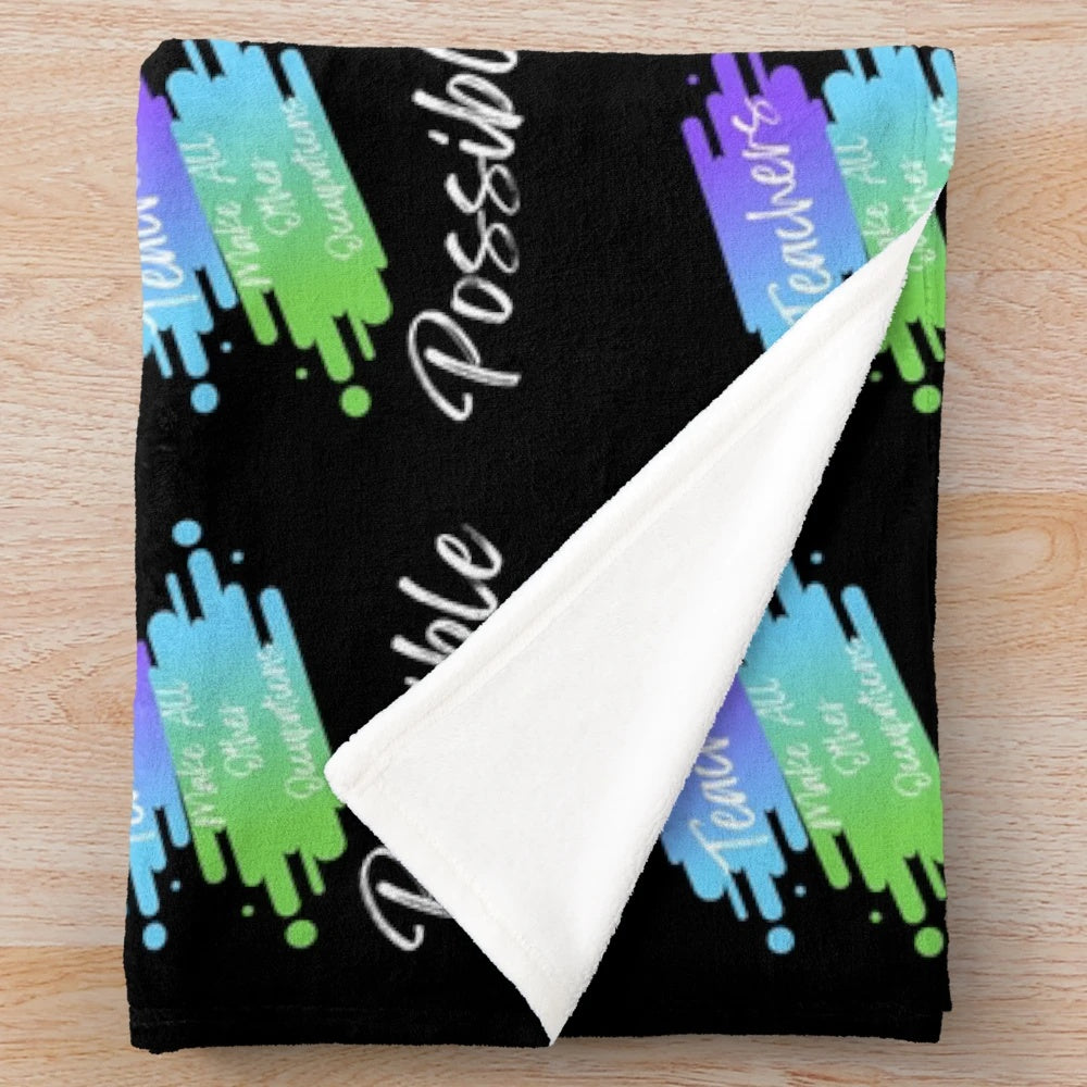 Colorful plush blanket with the text "Teachers Make All Other Occupations Possible