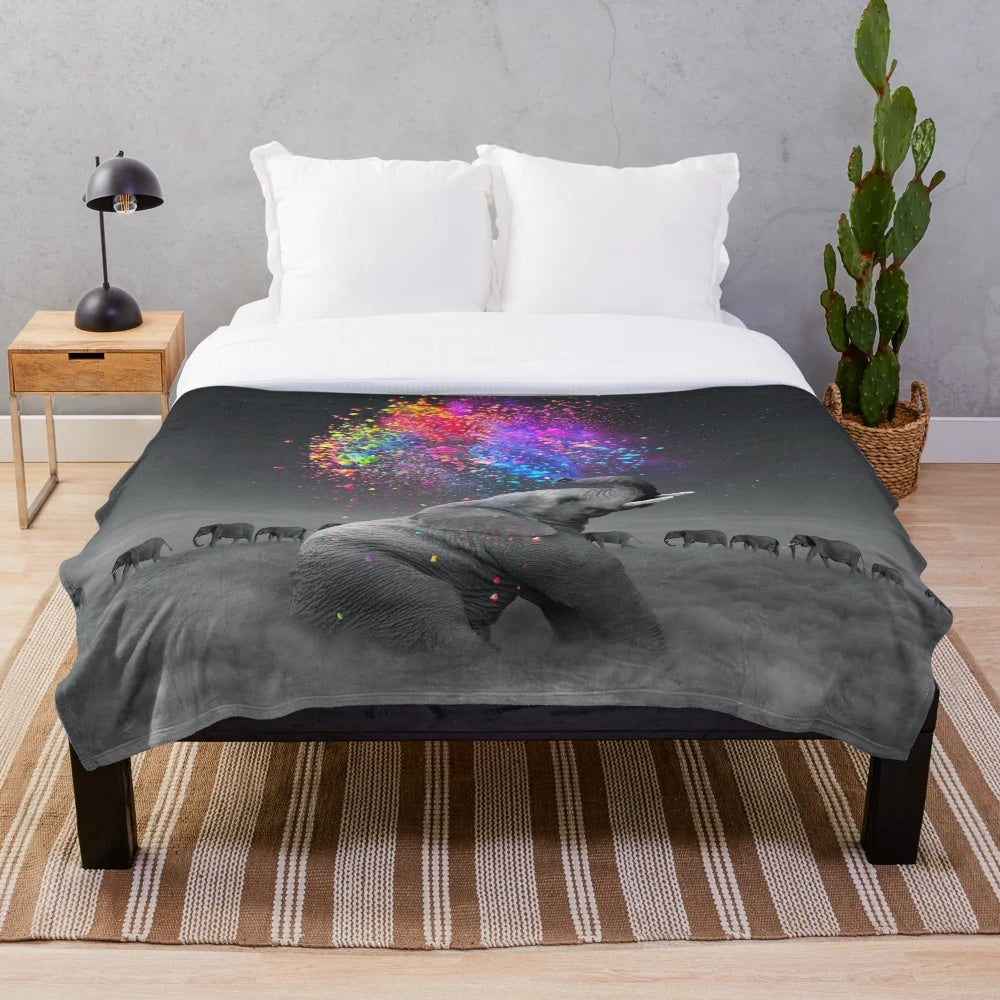 Vibrant plush blanket featuring a surreal rainbow elephant design