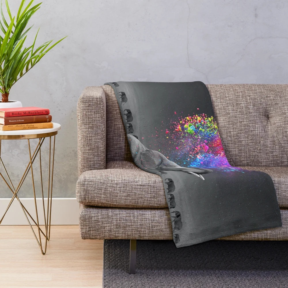 Vibrant plush blanket featuring a surreal rainbow elephant design