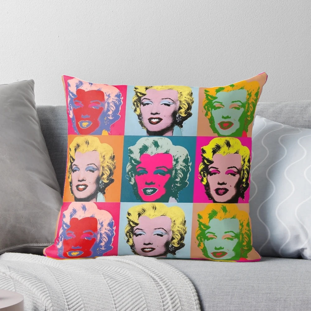Vibrant pop art pillow featuring Marilyn Monroe's iconic image, designed in the style of Andy Warhol.