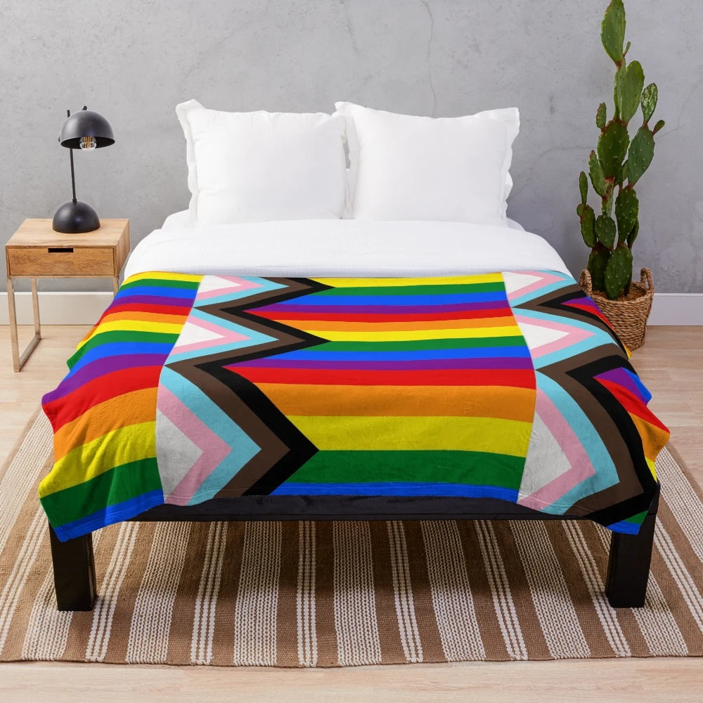 Colorful progress pride flag plush blanket with stripes of the LGBTQ+ pride flag