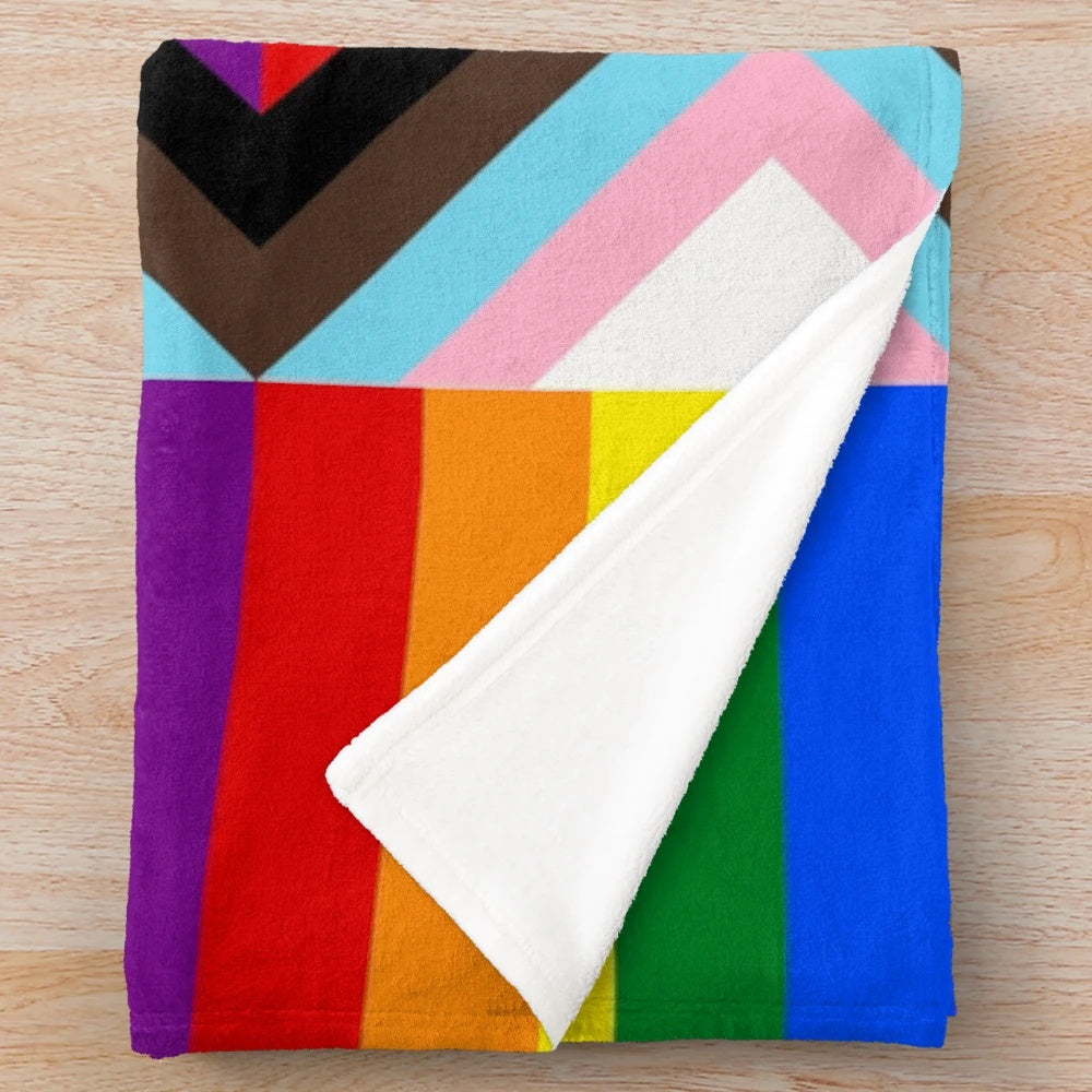 Colorful progress pride flag plush blanket with stripes of the LGBTQ+ pride flag