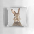 Colorful pillow featuring a rabbit or bunny illustration in a modern, minimalist style.