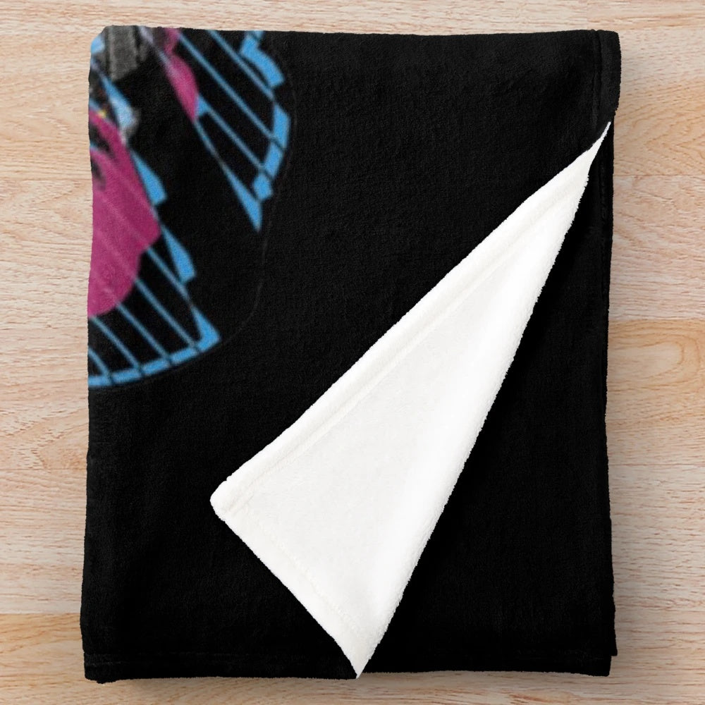 Colorful plush racing themed blanket with paint splatter design