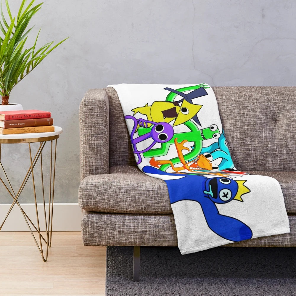 Cozy rainbow friends plush blanket featuring characters from the popular Roblox game