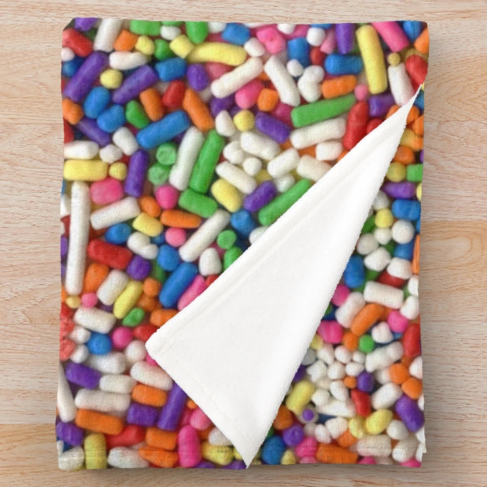 Colorful rainbow sprinkle pattern plush blanket