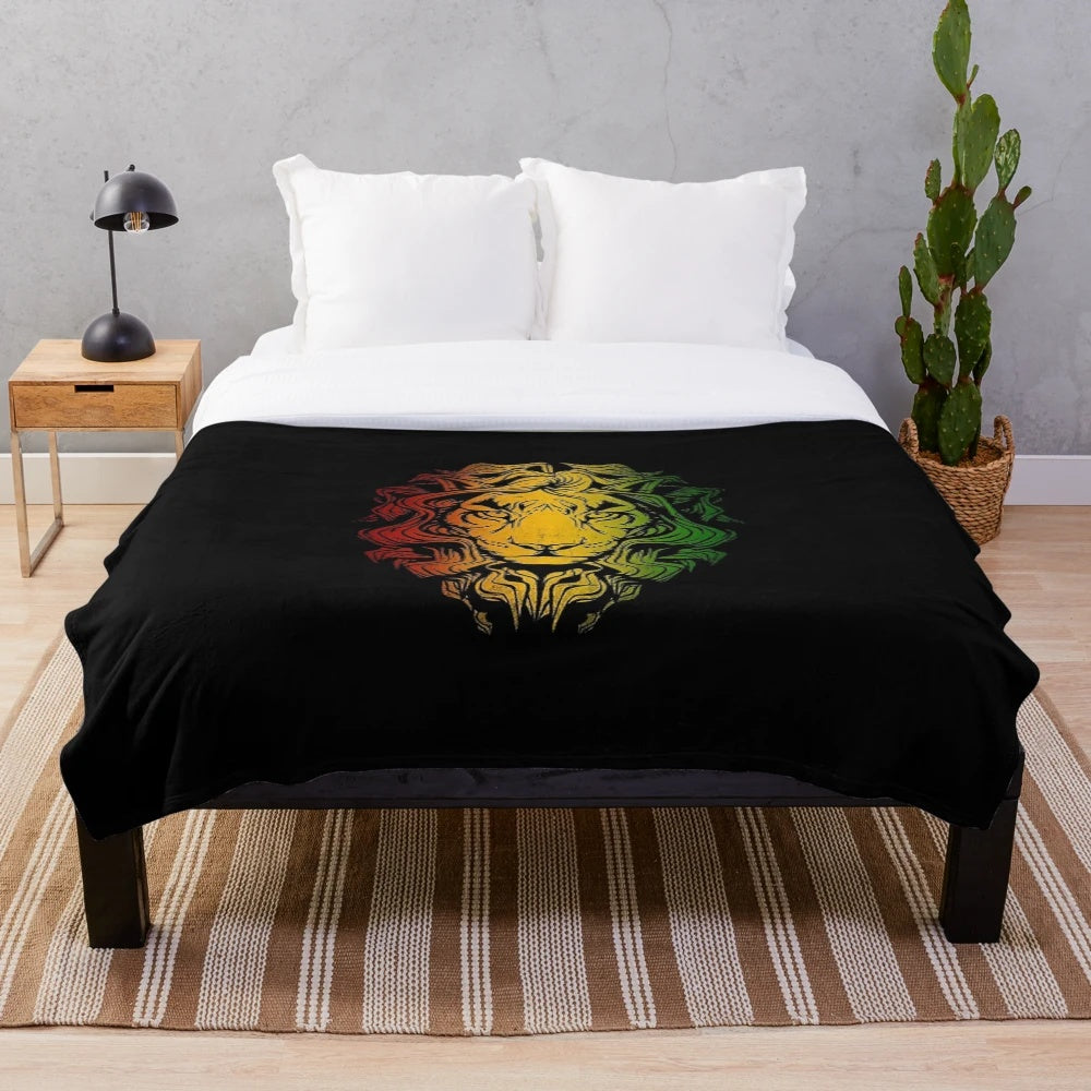 Vibrant plush blanket featuring a Rastafarian flag design with a stylized rasta lion graphic