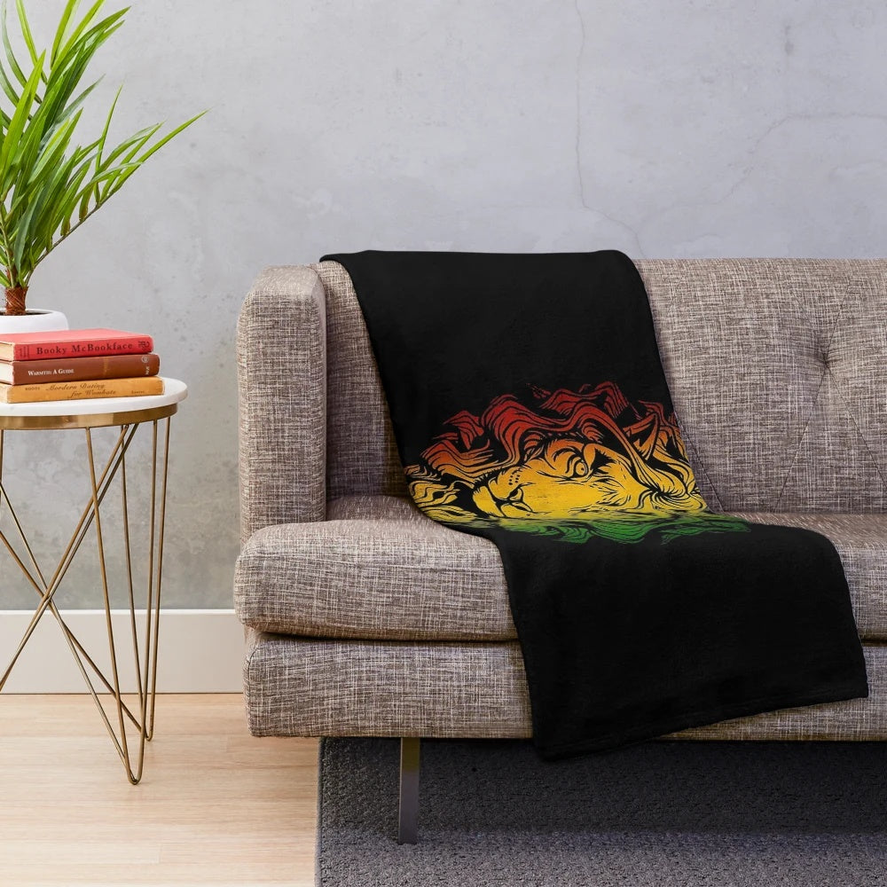 Vibrant plush blanket featuring a Rastafarian flag design with a stylized rasta lion graphic