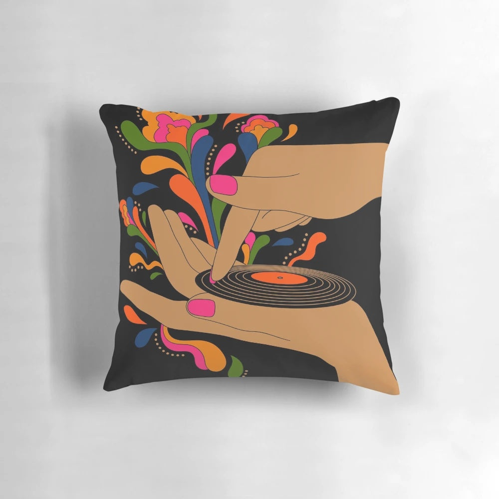 Colorful retro-style pillow featuring a psychedelic record player design