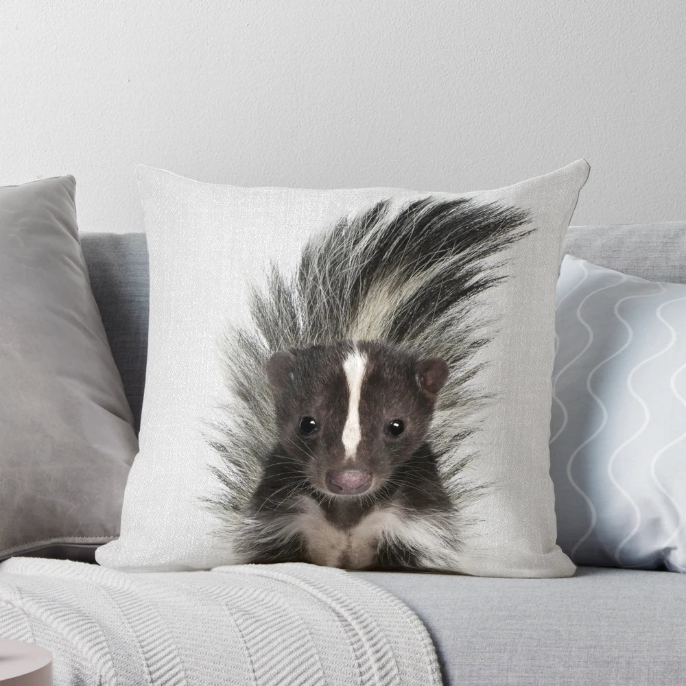 Vibrant and whimsical pillow featuring a stylized skunk portrait in a modern, minimalist design.