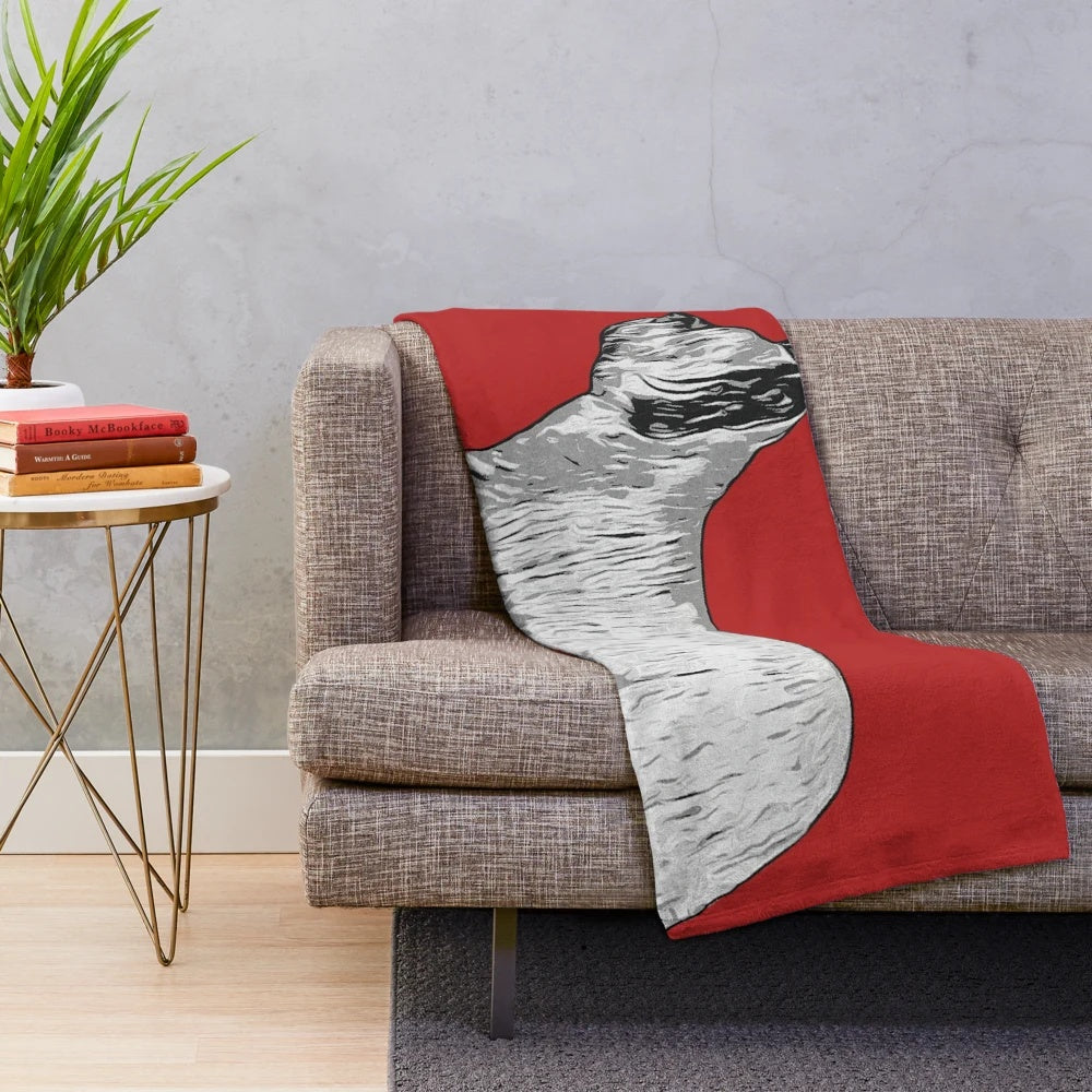 Colorful silhouette of a Skye Terrier dog on a plush blanket