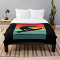 Colorful plush blanket featuring a snowboarding silhouette design