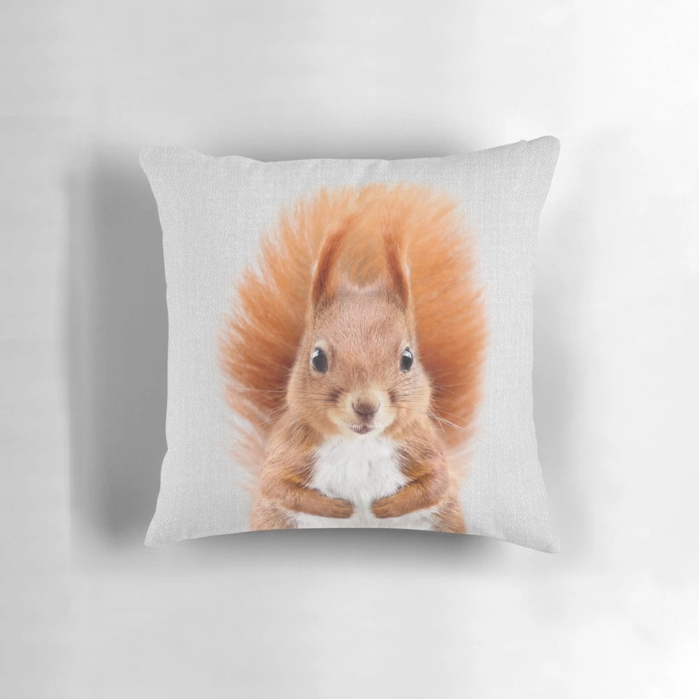 Vibrant, whimsical pillow featuring a colorful squirrel design, perfect for children's spaces.