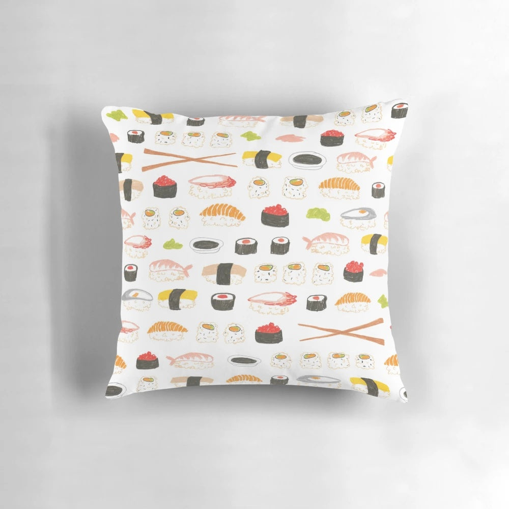 Vibrant sushi-inspired pattern printed on a soft, white pillow