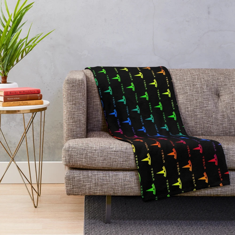 Colorful Tesla-inspired plush blanket with rainbow design