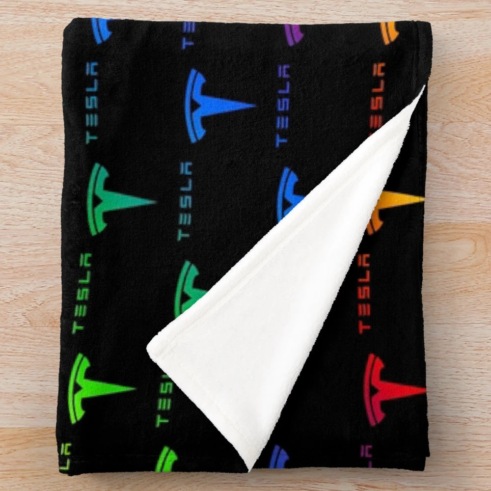 Colorful Tesla-inspired plush blanket with rainbow design
