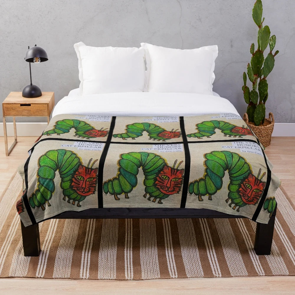Colorful plush blanket featuring The Very Hungry Caterpillar book character