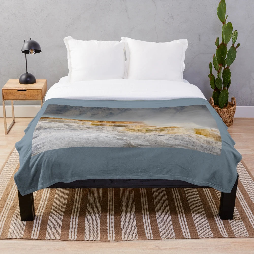 Colorful and textured plush blanket featuring thermal water landscapes from Yellowstone National Park