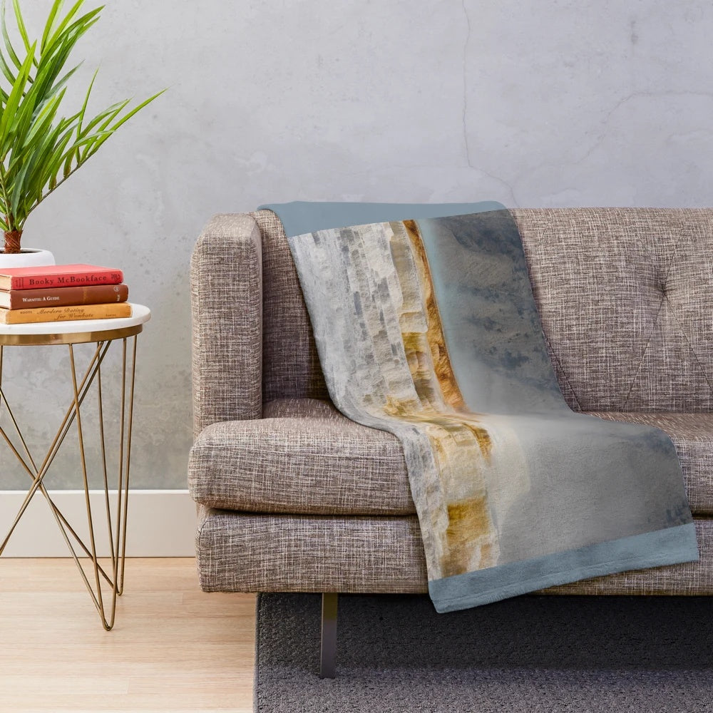 Colorful and textured plush blanket featuring thermal water landscapes from Yellowstone National Park