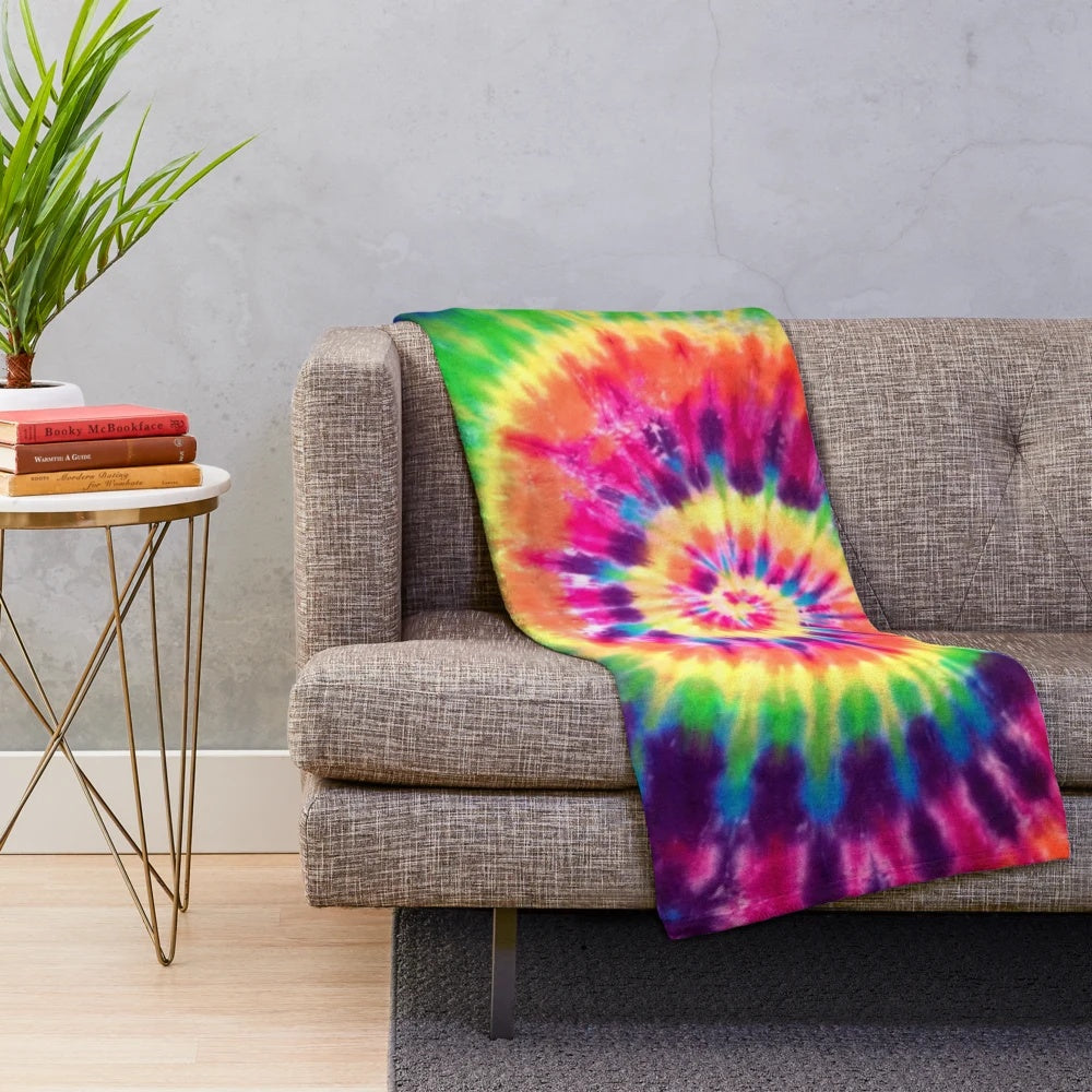 Tie dye plush blanket with vibrant rainbow colors