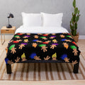 Colorful plush blanket with troll dolls pattern
