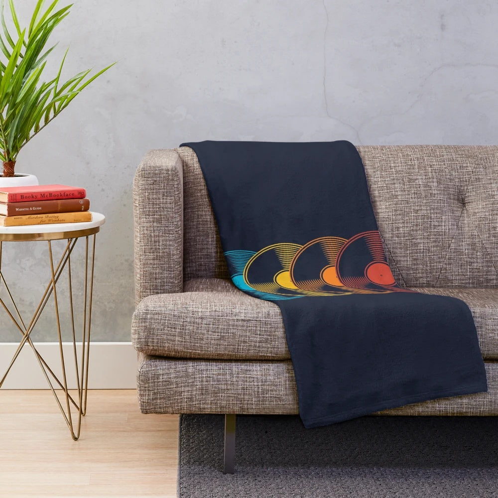 Colorful vinyl record-themed plush blanket