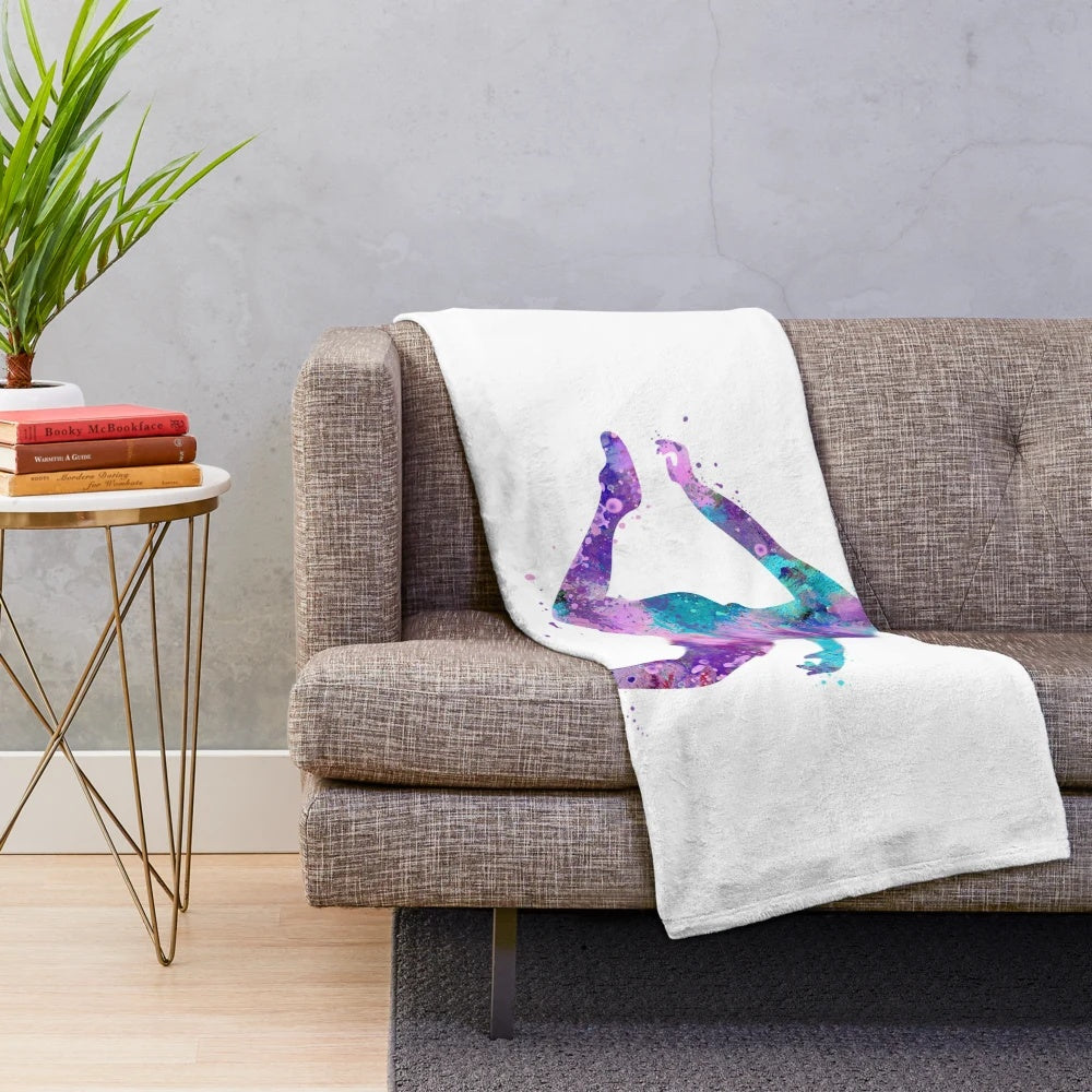 Colorful watercolor design of a girl soccer player on a plush blanket