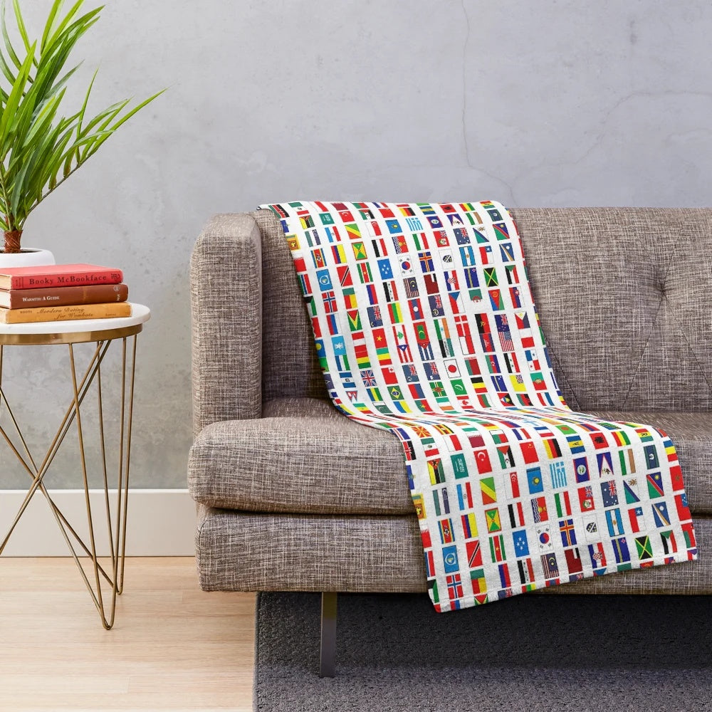 Colorful world flags printed on a soft plush blanket