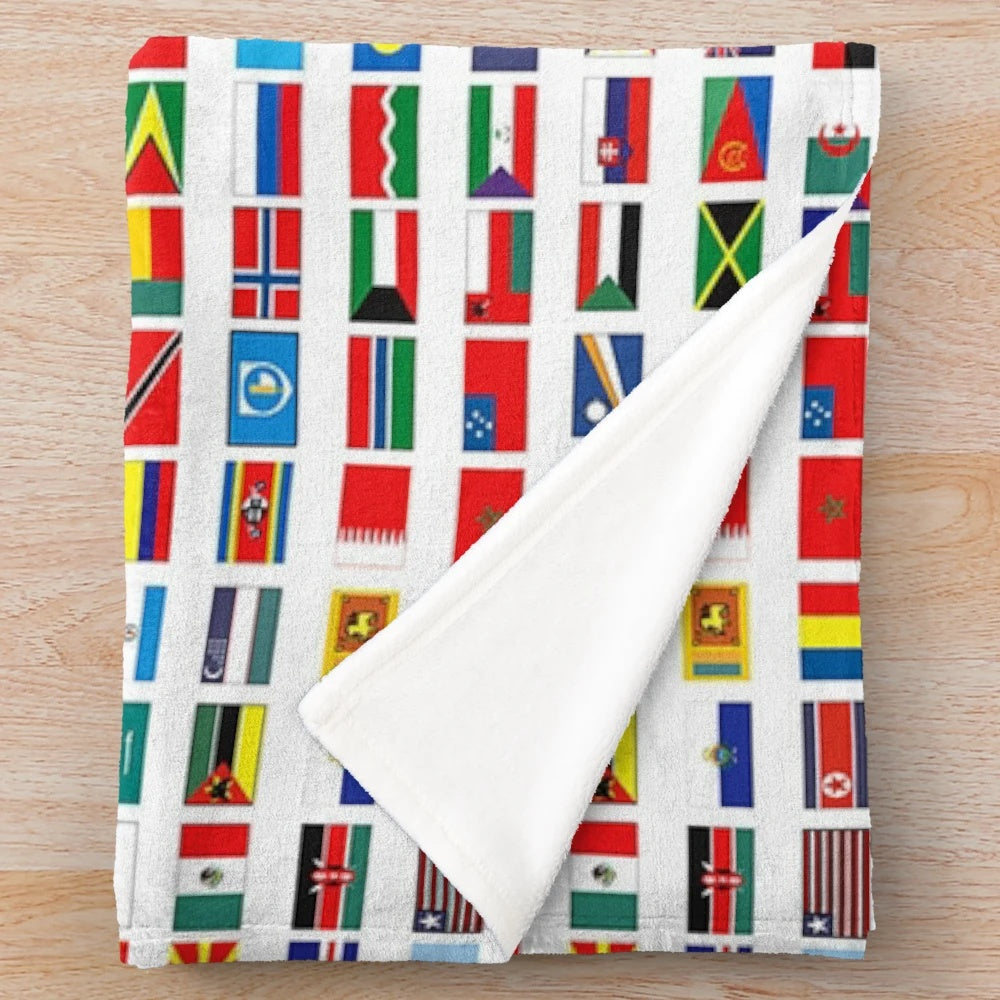 Colorful world flags printed on a soft plush blanket