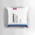 Colorful, retro-style pillow with Xanax-inspired design and rainbow colors