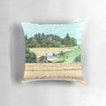 Pillow featuring a detailed image of a combine harvester working in a field