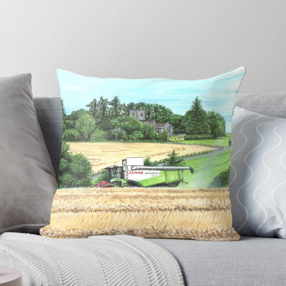 Pillow featuring a detailed image of a combine harvester working in a field