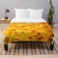 Soft, plush mac and cheese-themed blanket
