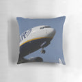 A soft, plush pillow depicting a Ryanair Boeing 737 aircraft at Schiphol Airport.