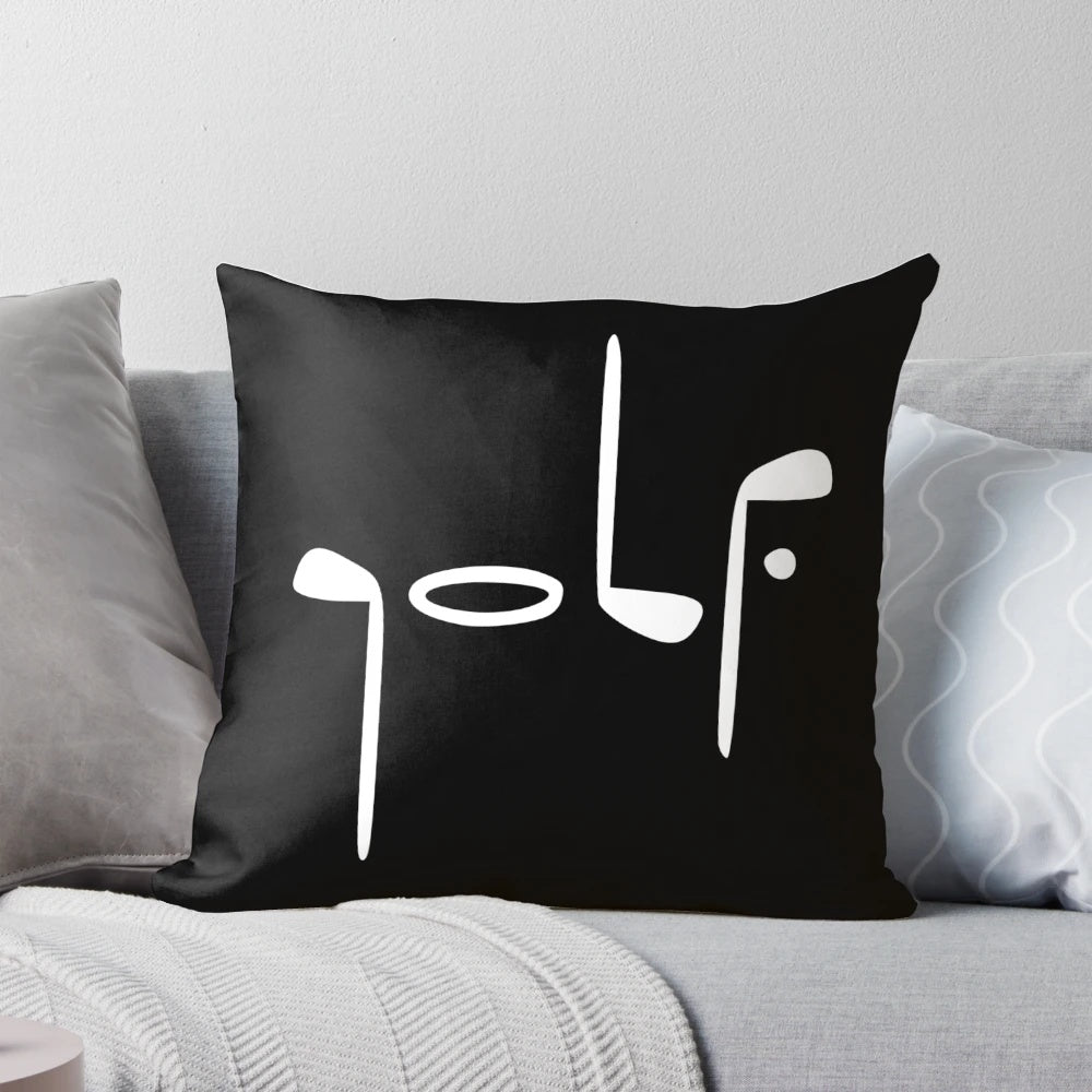 Soft, plush golf pillow with embroidered golf ball design