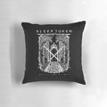 A plush green flower pillow featuring the Sleep Token metalcore band logo.
