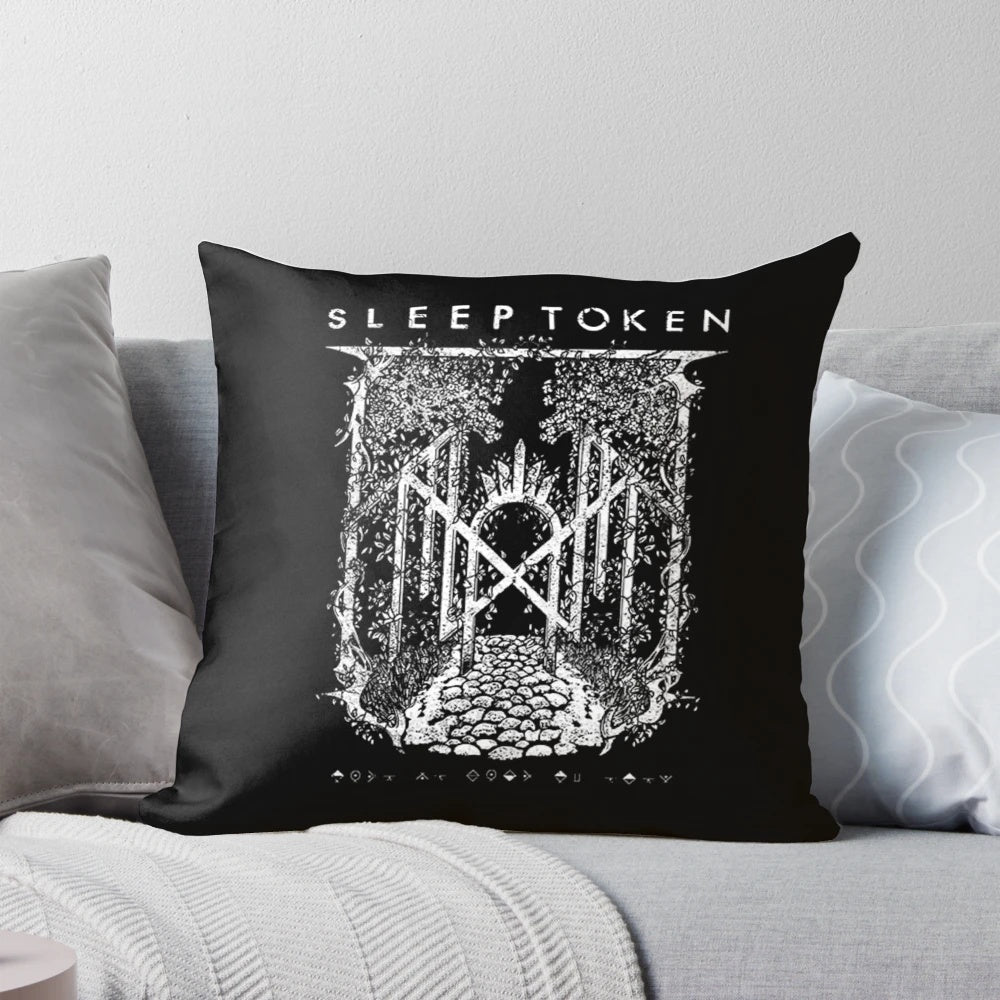 A plush green flower pillow featuring the Sleep Token metalcore band logo.