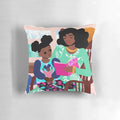 Rocking chair pillow with a black girl and mother design, perfect for a nursery or reading nook.