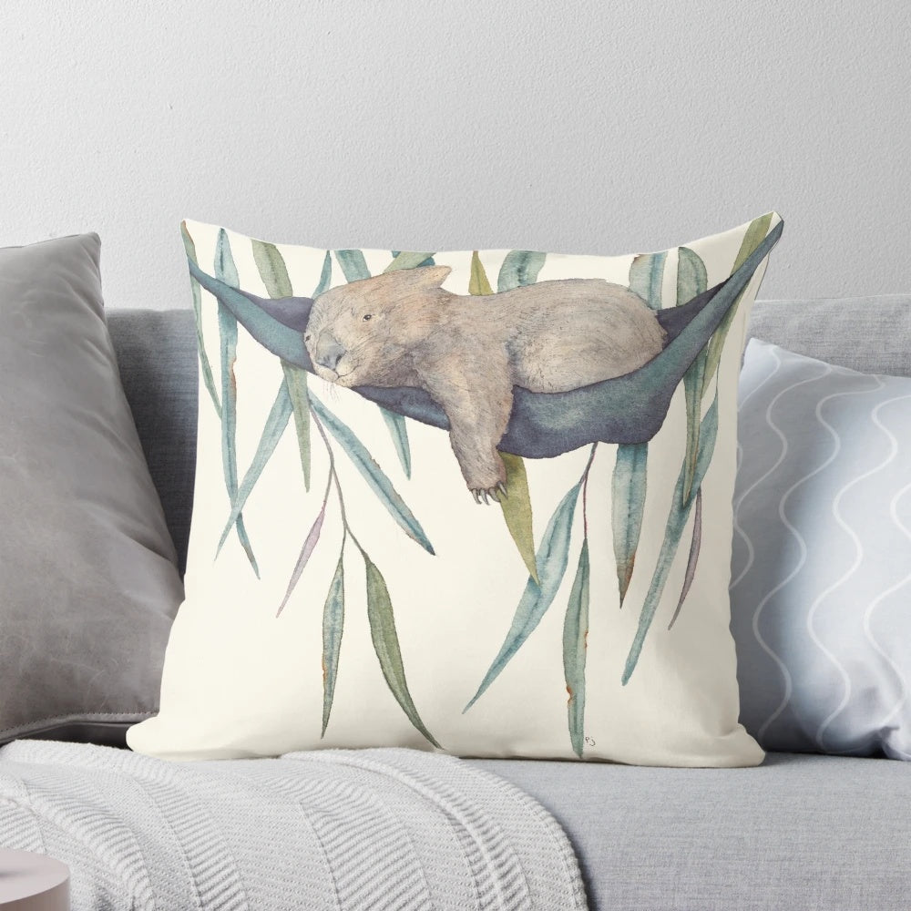 A cozy and comfortable pillow featuring a cute wombat design, perfect for afternoon naps or relaxation.